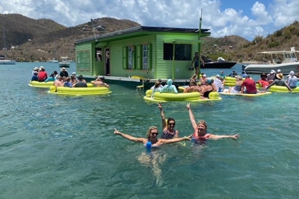 a group of people swimming in the water