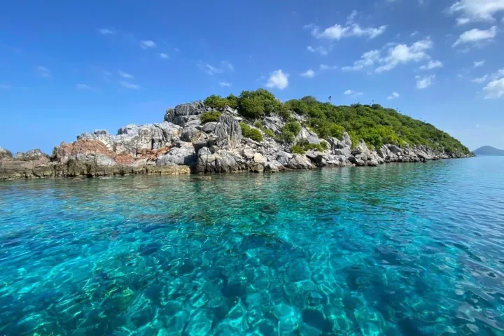 an island in the middle of a body of water