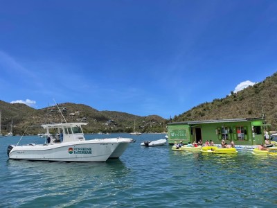 a small boat in a body of water