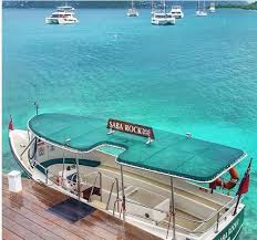 a boat parked next to a body of water