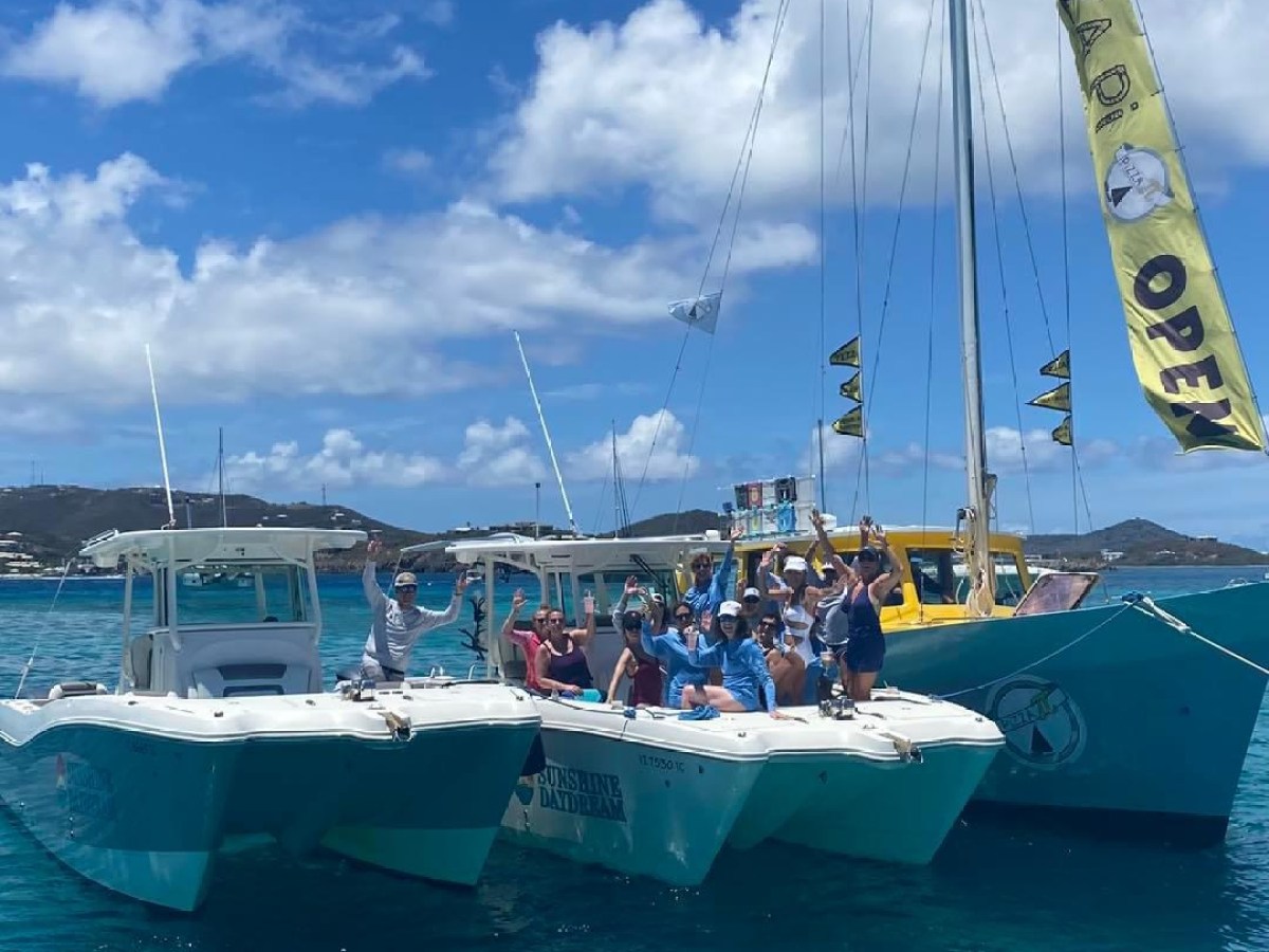 a boat is docked next to a body of water