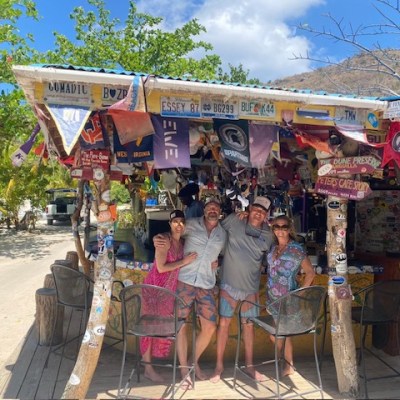 a group of people sitting at a bus stop