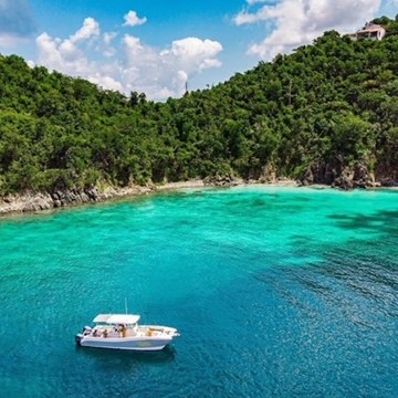 a small boat in a body of water